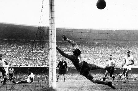 World Cup Final, 1950. Brazil. Maracana Stadium, Rio De Jainero. Brazil 1 v Uruguay 2. 16th July, 1950. Uruguay's Ghiggia scores the winning goal past Brazilian goakeeper Barbosa to win the World Cup for Uruguay and complete a major by upset by beating ho