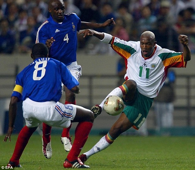 Diouf (à dir.), grande craque de Senegal na Copa.